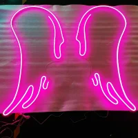 Angel Wings LED neon sign glowing vibrant pink and white, perfect for personalised Australian decor