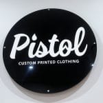 High quality custom acrylic wall sign with raised white lettering for Pistol Clothing