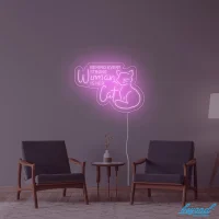 Behind Every Strong Woman Is Her Cat LED neon sign glowing vibrant pink and white in a stylish Australian setting