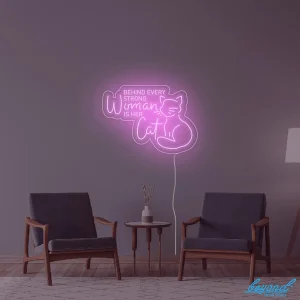 Behind Every Strong Woman Is Her Cat LED neon sign glowing vibrant pink and white in a stylish Australian setting