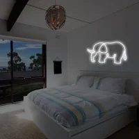 Elephant LED neon sign glowing vibrant yellow with a playful and eye-catching vibe