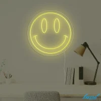 Smiley Face LED neon sign glowing bright yellow with a happy cheerful vibe in Australia