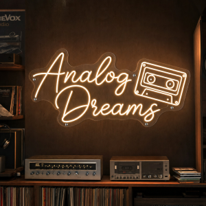Analog Dreams neon text sign glowing on wall