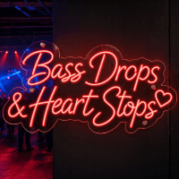 Bass Drops and Heart Stops LED neon sign with music icons