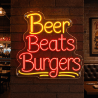 Beer Beats Burgers neon sign glowing in bar setting