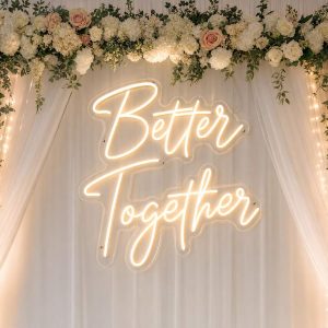 Custom Better Together LED neon sign for weddings and engagement parties. Contour-cut acrylic backin