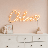 Chloe Name LED Neon Sign - warm orange cursive script with heart on contour cut acrylic