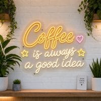Coffee Is Always A Good Idea LED neon sign on clear acrylic backing mounted on white brick wall