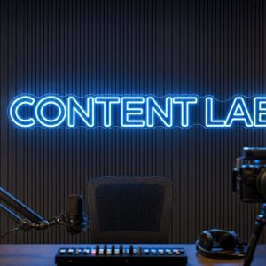 Content Lab LED neon sign in ice blue in futuristic creator office with premium production setup