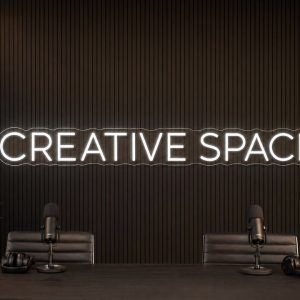 Creative Space LED neon sign in white in luxury co-working office with premium minimal styling