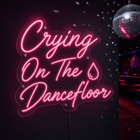 Crying On The Dancefloor neon text sign glowing bright
