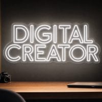 Digital Creator Neon Sign Digital Creator LED neon sign in white in premium creator office with luxury production environment