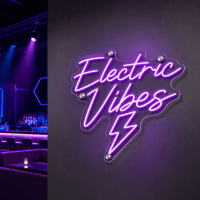 Electric Vibes Neon Sign glowing in a music venue