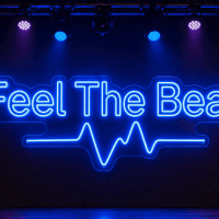 Feel The Beat LED neon sign in bold rounded font with minimal heartbeat pulse in blue on stage background