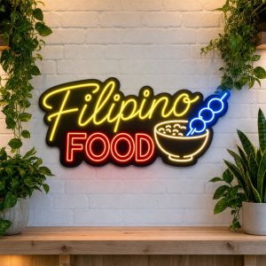 Filipino Food LED neon sign on clear acrylic backing mounted on white brick wall
