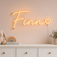 Finn Name LED Neon Sign - warm orange cursive script with heart on contour cut acrylic