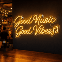 Good Music Good Vibes LED neon sign glowing on wall