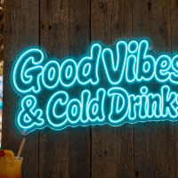 Good Vibes and Cold Drinks LED Neon Sign - vivid cyan retro bubble font on tropical beach bar wooden wall