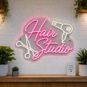 Hair Studio LED neon sign with scissors and hair dryer icons on clear acrylic backing
