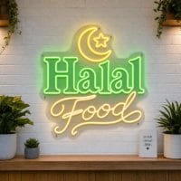 Halal Food LED neon sign on clear acrylic backing mounted on white brick wall