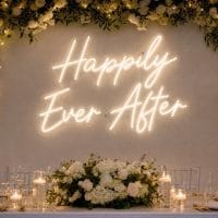 Custom Happily Ever After LED neon sign for weddings and receptions. Contour-cut acrylic backing, si
