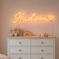 Hudson Name LED Neon Sign - warm orange cursive script with heart on contour cut acrylic