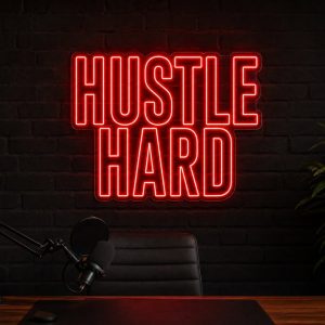 Hustle Hard Neon Sign Hustle Hard LED neon sign in red in industrial black office with masculine creator vibe