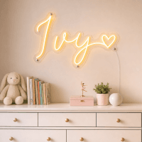 Ivy Name LED Neon Sign - warm amber cursive script with heart on contour cut acrylic