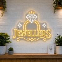 Jewellers Shop LED neon sign with diamond ring icon on clear acrylic backing