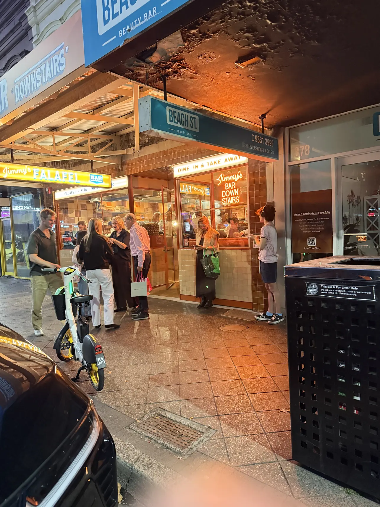 Orange LED neon signage at Jimmy’s Falafel Paddington created by Beyond Neon Signs for the Merivale restaurant venue
