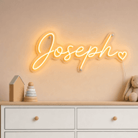 Joseph Name LED Neon Sign - warm orange cursive script with heart on contour cut acrylic