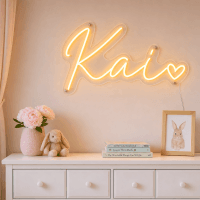 Kai Name LED Neon Sign - warm amber cursive script with heart on contour cut acrylic
