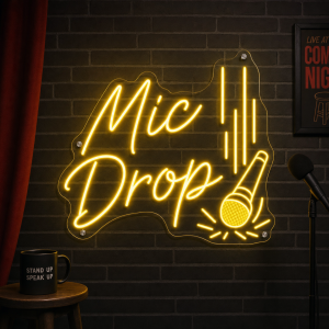 Mic Drop LED neon sign glowing on wall