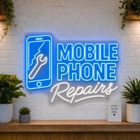 Mobile Phone Repairs LED neon sign with cracked screen phone icon on clear acrylic backing mounted on white brick wall