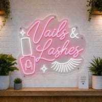 Nails and Lashes LED neon sign with nail polish bottle and eyelash icons on clear acrylic backing