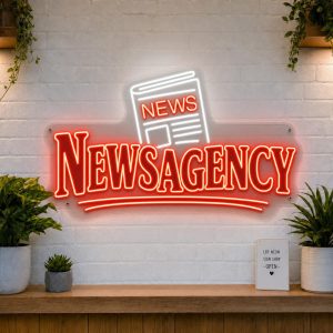 Newsagency LED neon sign with newspaper icon on clear acrylic backing mounted on white brick wall