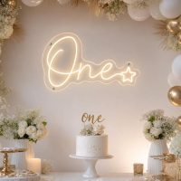 Custom One First Birthday LED neon sign for first birthday parties. Contour-cut acrylic backing, sil