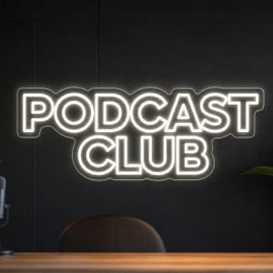 Podcast Club LED neon sign in white on premium black wall with modern social creator vibe