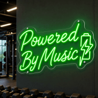 Powered By Music neon sign glowing on wall