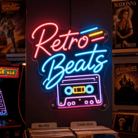Bright retro beats neon sign with icon glowing in a bar