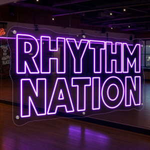 Rhythm Nation text LED neon sign glowing on wall