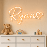 Ryan Name LED Neon Sign - warm orange cursive script with heart on contour cut acrylic