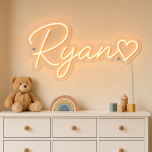 Ryan Name LED Neon Sign - warm orange cursive script with heart on contour cut acrylic