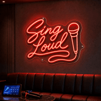 Sing Loud LED neon sign glowing in music venue