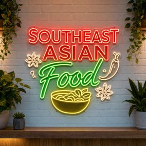 Southeast Asian Food LED neon sign on clear acrylic backing mounted on white brick wall