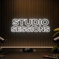 Studio Sessions Neon Sign Studio Sessions LED neon sign in white in dark luxury recording studio with subtle LED room lighting