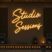 Studio Sessions text neon sign glowing in a creative space
