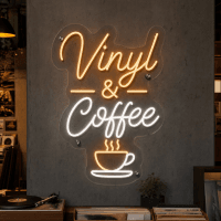 Vinyl and coffee neon sign glowing on wall