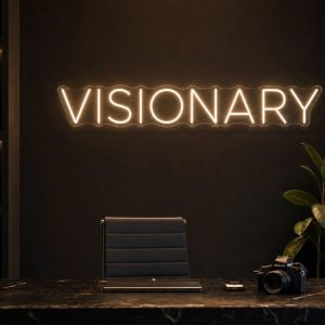 Visionary LED neon sign in warm white in luxury entrepreneur office with premium black interior