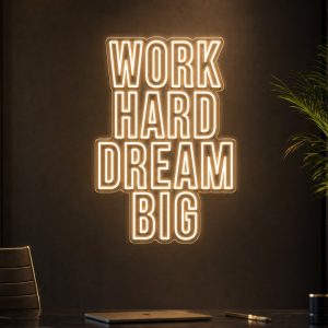 Work Hard Dream Big LED neon sign in warm white in luxury entrepreneur office with cinematic lighting